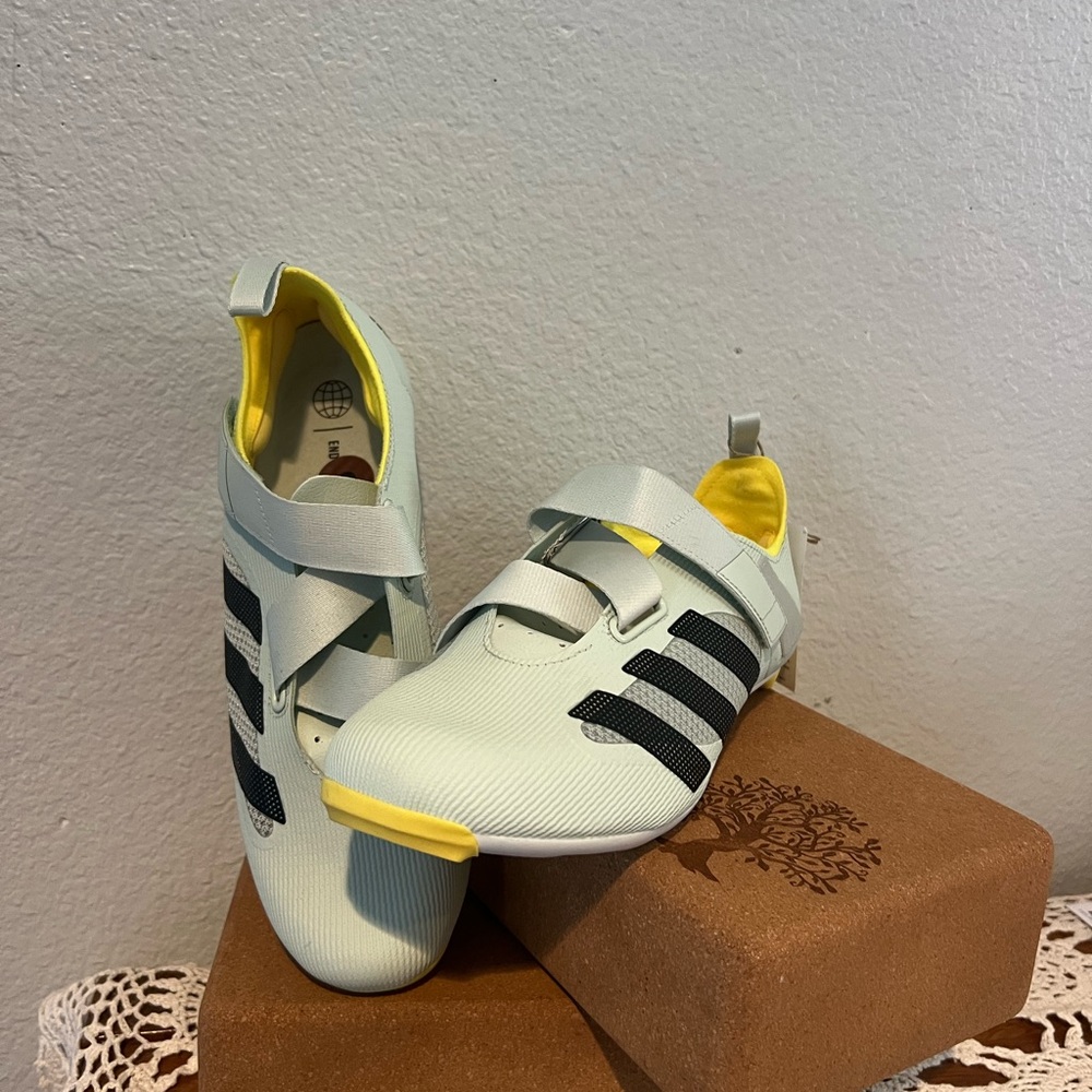 adidas Women's Athletic Shoes - White and Black with Yellow Accents.